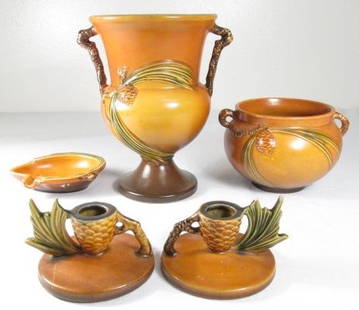 FIVE PIECES ROSEVILLE "PINECONE" ART POTTERY: VASE,: Five pieces of Roseville "Pinecone" pattern art pottery. Includes an 8.25" tall handled vase, two 2.75" tall candlesticks, one small 4" tall jardiniere, and a 4.75" wide ashtray. Each piece marked on