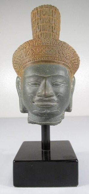 KHMER CAMBODIAN HAND CARVED STONE HEAD BUST: A stone head bust of a 9th - 12th period kings of the Khmer. This 7.5" tall head was hand carved in Cambodia, South East Asia. Measurement: Total height is 10.5" tall, base is 3.5 square. Condition: b