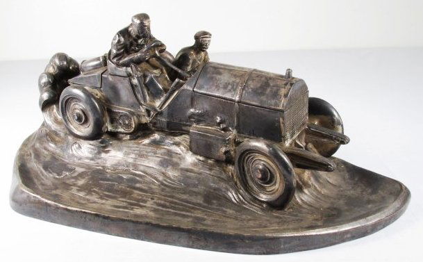 VINTAGE SILVER PLATED AUTOMOBILE INKWELL & PEN REST: Early 20th century silver plated white metal automobile themed inkwell and pen rest desk accessory. Hood of the car lifts to reveal inkwell with inset, trunk of the car raises for pen tip storage. Unm