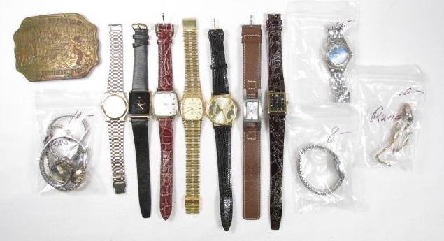 VINTAGE & DESIGNER WATCH LOT, TIFFANY BELT BUCKLE: A group of vintage and designer wrist watches plus a Tiffany brass man's belt buckle. Watch brands include: Helbros, Wittnauer, Timex, Grant, Gucci, Bill Blass & more. Condition: As-is, estate found c