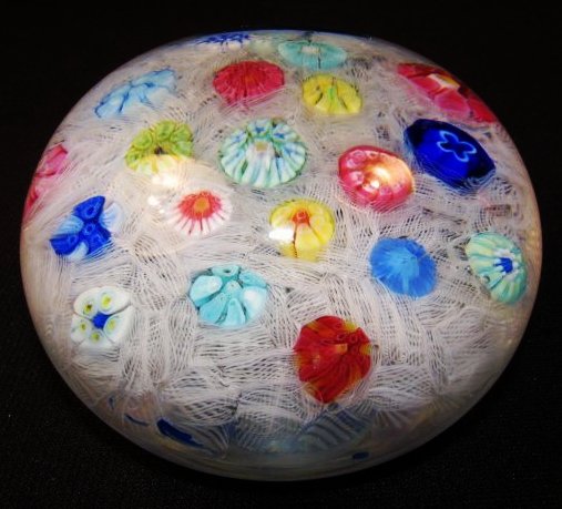 VINTAGE BACCARAT SCRAMBLE-TYPE GLASS PAPERWEIGHT: Vintage Baccarat scramble-type glass paperweight. Marked on base with "1971", "256", and acid etched maker's mark. Also marked inside weight with "B1971" cane. Condition: good, a few small scratches t