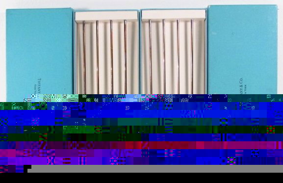 EIGHT TIFFANY & CO STERLING SILVER MINT JULEP STRAWS: Eight sterling silver Tiffany & Co. sterling silver mint julep straws with mint-leaf bowls. Two boxed sets with four each. Each straw measures 8.5". Total weight for shipping 7 ounces. Condition: appe