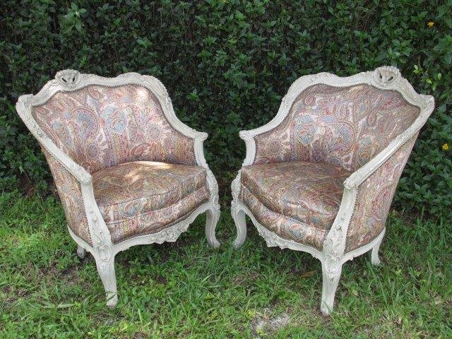 PAIR FRENCH ROCOCO STYLE BERGERE CHAIRS: Pair of 19th century French Rococo style Bergere chairs. Painted with a subtle grey/slate type color, and with matching paisley pattern upholstery. Condition: minor signs of wear to frame, some paint 