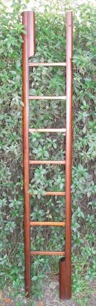 EARLY 20TH CENTURY MAHOGANY FOLDING LIBRARY LADDER: Early 20th century Mahogany folding ladder. When folded, measures a total of 89.5" long x 3.5" x 2.75". When unfolded, measures 78.5" long x 13.25" wide. Latch at the top and bottom to hold together w