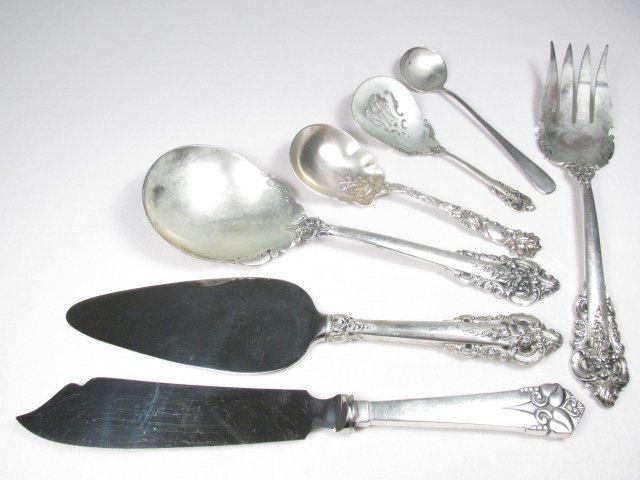 WALLACE "GRAND BAROQUE" STERLING SILVER UTENSILS, ETC.: Wallace "Grand Baroque" sterling silver utensils, sold along with a few other sterling silver utensils. Wallace "Grand Baroque" sterling pieces include: a 5.3" tomato server, a 9.3" serving fork, a 9.