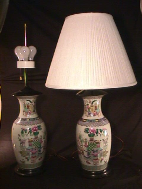 PR HAND PAINTED FLORAL ORIENTAL STYLE TABLE LAMPS: PR HAND PAINTED FLORAL ORIENTAL STYLE TABLE LAMPS Each lamp measures 36" high x 8 1/2" wide, shades are 15 1/4" high x 20" wide. Each lamp hold 3 light bulbs. Good condition. Not antique.