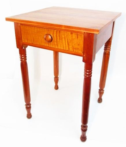 19TH C SHERATON STYLE CHERRY WOOD ONE DRAWER STAND: 19th century carved cherry wood one drawer stand measuring 28" tall x 20.25" wide x 20" deep. Curly maple finished drawer front. Condition: some modern reinforcements added to drawer and drawer track,