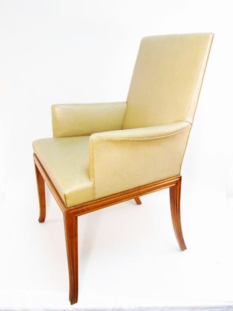 T.H. ROBSJOHN-GIBBINGS ARMCHAIR FOR SARIDIS OF ATHENS: Mid-Century Terence Harold Robsjohn-Gibbings leather upholstered armchair for Saridis of Athens. Marked with metal plate under seat "Designed By- T.H. Robsjohn-Gibbings. Manufactured by- Saridis of At