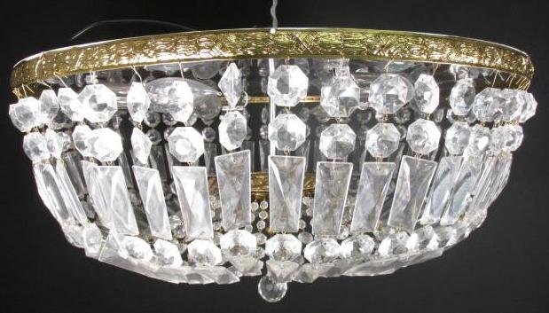 LARGE VINTAGE FACETED CRYSTAL FLUSHMOUNT CHANDELIER: Draped with faceted glass crystals, this large fixture evokes the lighting in grand hotel ballrooms. Measurements: 24" across at ceiling, 11" drop plus hanging crystal ball. Condition: Good, metal sho