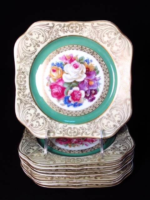 EIGHT TIRSCHENREUTH BAVARIAN FLORAL PORCELAIN PLATES: Lot of eight Tirschenreuth Bavarian porcelain plates, each measuring 8" x 8" square. Condition: good, no chips or cracks, very minor wear to gilded rims, see images. Weight: 5.6 lbs.