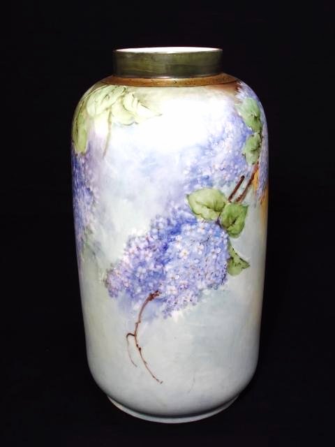 LARGE ANTIQUE LIMOGES HAND PAINTED PORCELAIN VASE: Large antique Limoges hand painted porcelain vase measuring 14.4" tall x approx. 7.25" wide. Marked on base with "P.L. Limoges" mark, and signed near rim "E.A. Bess". Condition: good, no chips or crac