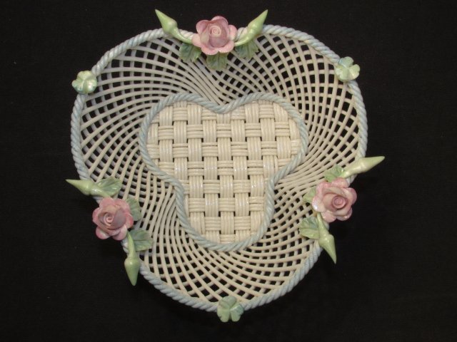 BELLEEK IRISH PARIAN "SHAMROCK" BASKET: A Belleek Irish Parian "Shamrock Basket, four strand basket with hand painted applied roses and shamrocks. 7th mark (1985-1989) Measurements: Height 2 1/2 in., length 5 1/4 in.. Condition: Like new in