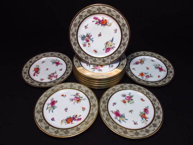 TWELVE TIRSCHENREUTH BAVARIAN CABINET PLATES 10.75": Lot of twelve 10.75" Tirschenreuth Bavarian porcelain plates. Each one with florals within a gilded border. Each plate marked on base. Condition: very minor signs of use/wear, one plate has a tiny fla