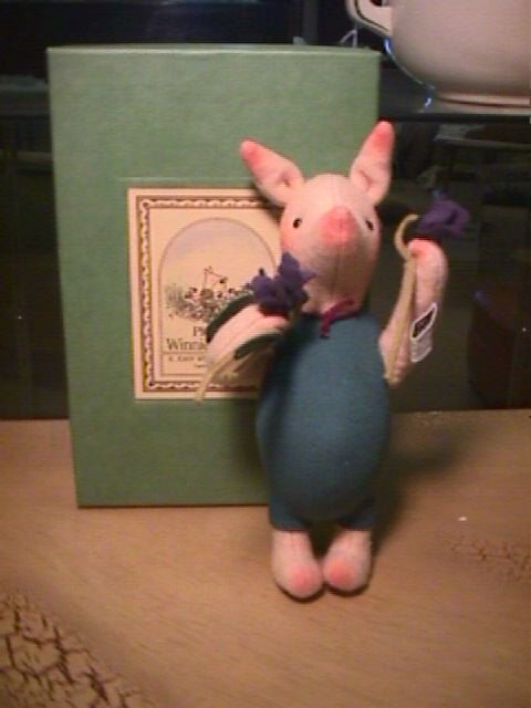 ORIGINAL R JOHN WRIGHT DOLL PIGLET: ORIGINAL R JOHN WRIGHT DOLL PIGLET Piglet with violets 1988-89, 7" standing, fully jointed. Limited Edition 1372 of 2500, Original box with certificate and papers.