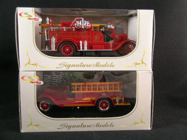 SIGNATURE MODELS REO FORD MODEL T FIRE TRUCKS 2 PC: Lot 870: SIGNATURE MODELS REO FORD MODEL T FIRE TRUCKS 2 PCS - 1926 Ford Model T Fire truck and 1928 REO fire truck. Both new in box. Boxes are 8" long x 4" wide x 3 3/4" high. Good condition.