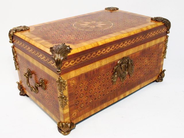 SMALL MAITLAND SMITH MARQUETRY INLAID WALNUT CHEST: A small Maitland Smith marquetry inlaid walnut chest or box. Ormolu style mounts at corners. Marked with metal tag inside. Condition: generally good, no signs of wear or age, see images. Measures 8.75