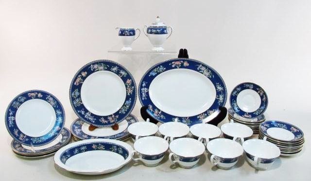 WEGDWOOD "BLUE SIAM" PORCELAIN DINNERWARE: 37 PIECES: Wedgwood "Blue Siam" porcelain dinnerware. Includes a total of 37 pieces: (4) dinner plates, (4) salad plates, (17) saucers, (8) bouillon cups, various trays and servers, see images. Condition: good, 
