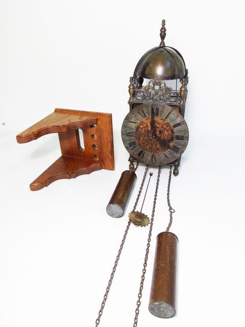19TH C ROBERT EVANS HALSTEAD LANTERN CLOCK: 19th century Robert Evans, Halstead lantern clock with wall bracket. Includes weights and pendulum. Condition: original movement, casing shows signs of wear and age to finishes, signs of age throughou