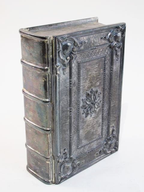 JENNINGS BROTHERS SILVER PLATED BOOK FORM BOX: Jennings Brothers silver plated book form box measuring 3" tall x 9" wide and 6.5" deep. Marked "JB" on base. Condition: good, tarnishing, see images. Weight: 4.3 lbs.