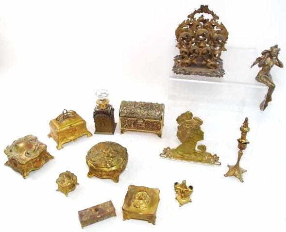ASSORTED GOLD TONE ART NOUVEAU DECORATIVES, BOXES, ETC.: Lot of assorted gold tone Art Nouveau and other decoratives, dresser boxes, candlesticks, vases, letter stand, etc. Condition: minor signs of wear/age as expected, see images. Tallest piece is the let
