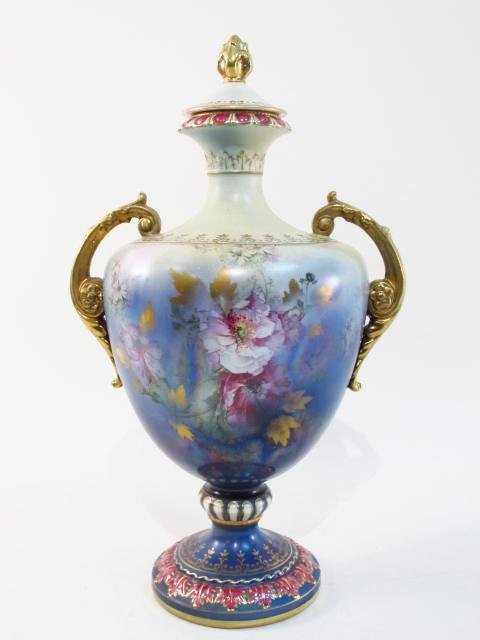 19TH C FRANZ MEHLEM ROYAL BONN PORCELAIN COVERED URN: 19th century Franz Mehlem Royal Bonn floral porcelain covered urn measuring a total of 15.75" tall x 9.25" wide. Marked and incised on base with "FM Royal Bonn" mark. Condition: good, no chips or crac