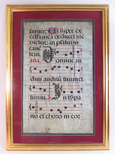 LATIN ILLUMINATED MUSIC PAGE: A Latin Illuminated Music page, framed and under glass. Frame measures 39" tall x 28" wide. Weight approx. 15 lbs.