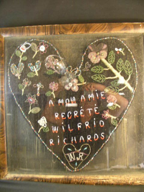 CR 1921 BEADED FUNERAL MEMENTO GESSO SHADOW BOX FR: Lot 637: CR 1921 BEADED FUNERAL MEMENTO GESSO SHADOW BOX FRAME - Unusual antique beadwork bereavement memento with French and American Indian tones. Measures 24 1/2" square x 3" deep. Inside measureme