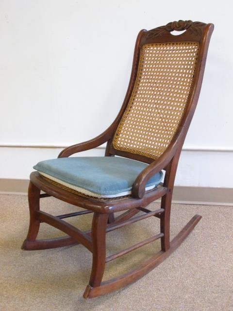 WICKER ROCKING CHAIR: Wicker rocking chair. Condition: as-is estate found condition, see photos. Weight: approx. 10 lbs.