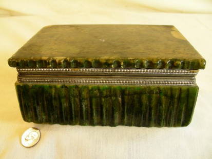 ITALIAN CARVED GREEN ALABASTER TRINKET BOX: Lot 1103: ITALIAN CARVED GREEN ALABASTER TRINKET BOX - Original label reads Genuine Alabaster, Made in Italy. Box measures 2" high by 5 1/4" wide by 4" deep. Silver tone metal mounts with bead