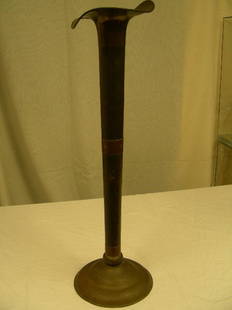 TALL ANTIQUE HAMMERED RUSSIAN BRASS COPPER VASE: Lot 1107: TALL ANTIQUE HAMMERED RUSSIAN BRASS COPPER VASE - Measures 28 1/2" high x 8 1/2" wide x 7 1/2" deep. Hallmark on bottom. Generally good condition. Hand hammered and joined. Nice unusual