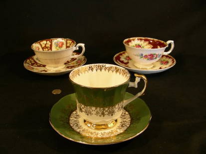 ROYAL GRAFTON ELIZABETHAN CHINA CUPS SAUCERS 3 SETS: Lot 1121: ROYAL GRAFTON ELIZABETHAN CHINA CUPS SAUCERS 3 SETS - All floral with gilt trim. Cups are 2 1/2" high x 4 3/4" wide and saucers are 5 1/2" wide. No chips, cracks or crazing. Good condition.
