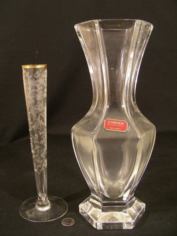 GORHAM CRYSTAL VASE & ETCHED GOLD RIM BUD VASE: Lot 186: GORHAM CRYSTAL VASE & ETCHED GOLD RIM BUD VASE - Gorham vase has original tag and is marked on base. Measures 10" high by 4 1/2" wide. Good condition. Bud vase measures 8" high by 2 3/4" wide