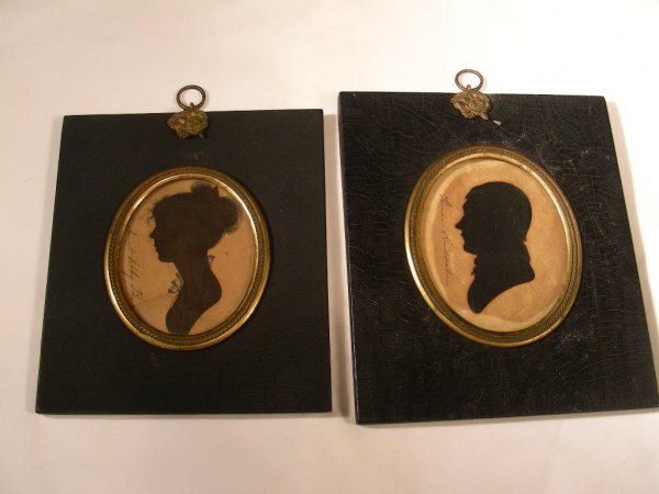 PAIR ANTIQUE MINIATURE FRAMED SILHOUETTES: Lot 412: PAIR ANTIQUE MINIATURE FRAMED SILHOUETTES - Man is signed "Homer Hinesdale" and woman is "Aunt Abby Bea?". Some foxing, small tears, water marks. Overall measurement on man is 6 1/2" tall x 5