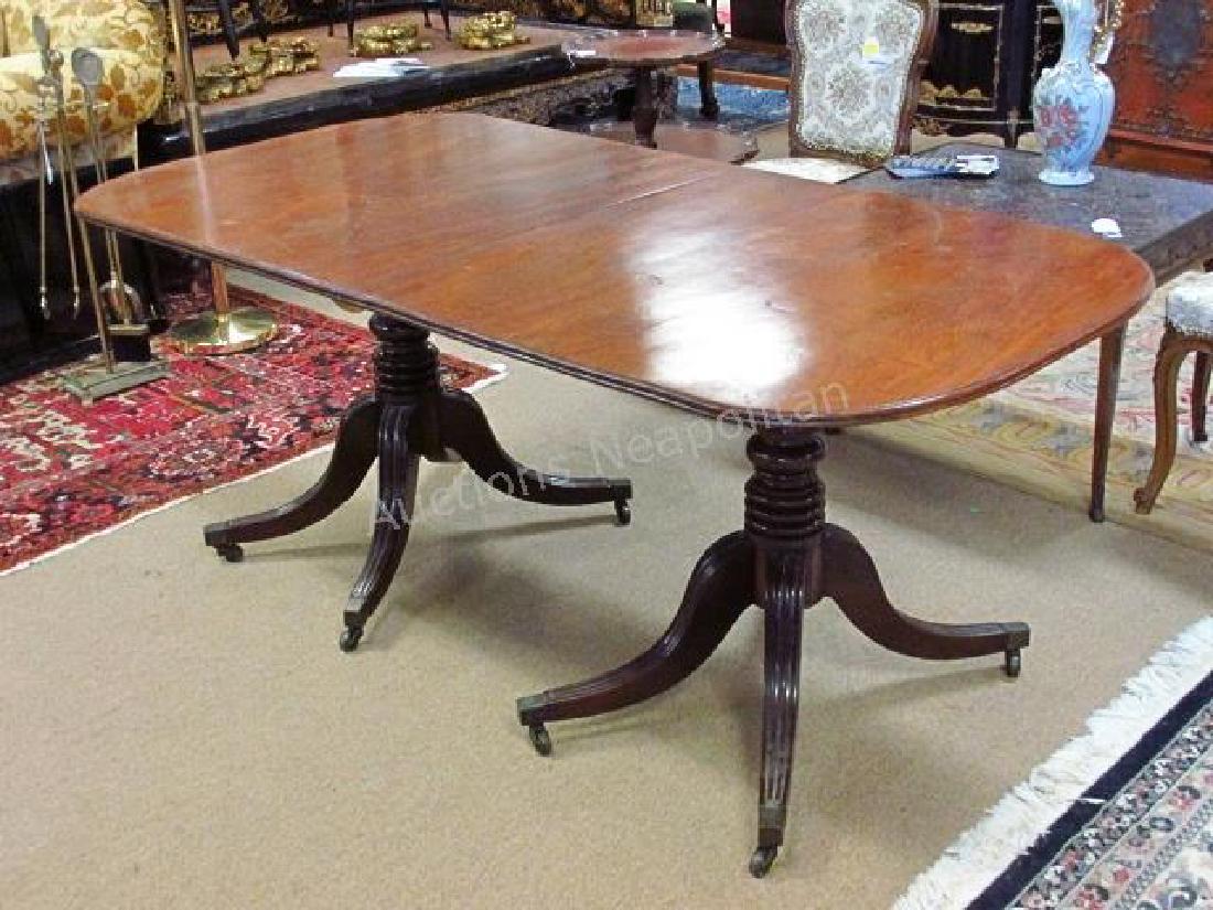 DUNCAN PHYFE STYLE BURLED WALNUT DINING TABLE: Duncan Phyfe style burled walnut dining table (with leaf) measuring a total of 67" long (without leaf) x 27" tall. Leaf adds 23" to length. Table separated into two separate section for trasport or st