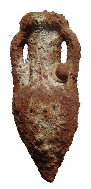 Roman terracotta amphora found in the sea: A Roman terracotta amphora found in the sea, 1st - 4th Century AD, with nicely tapered base and two handle. Attractive encrusted surfaces with a few adhering shells. H: 7 1/2" (19.1 cm). Intact. Ex Th