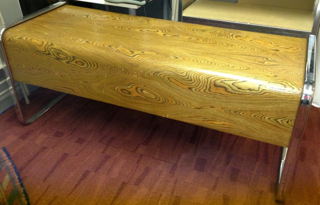 Herman Miller Desk by Peter Protzman: PETER PROTZMAN; HERMAN MILLER; Desk, USA, 1970's; Chromed steel, plastic and african bent wood laminate; Unmarked; 29 1/2'' x 65 1/2'' X 32'' p