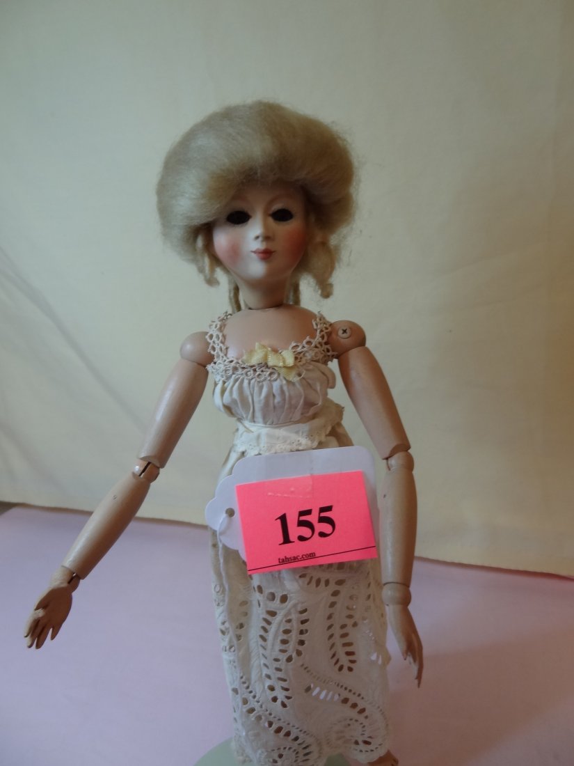 12.5'' BISQUE HEAD, ALL BODY JOINT WAIST, WRISTS, : 12.5'' BISQUE HEAD, ALL BODY JOINT WAIST, WRISTS, ANKLES, ELBOWS, KNEES, NECK AND SHOULDERS, BROWN GLASS EYES, BLONDE HAIR, MARKED '' LOIS BECK 1980''