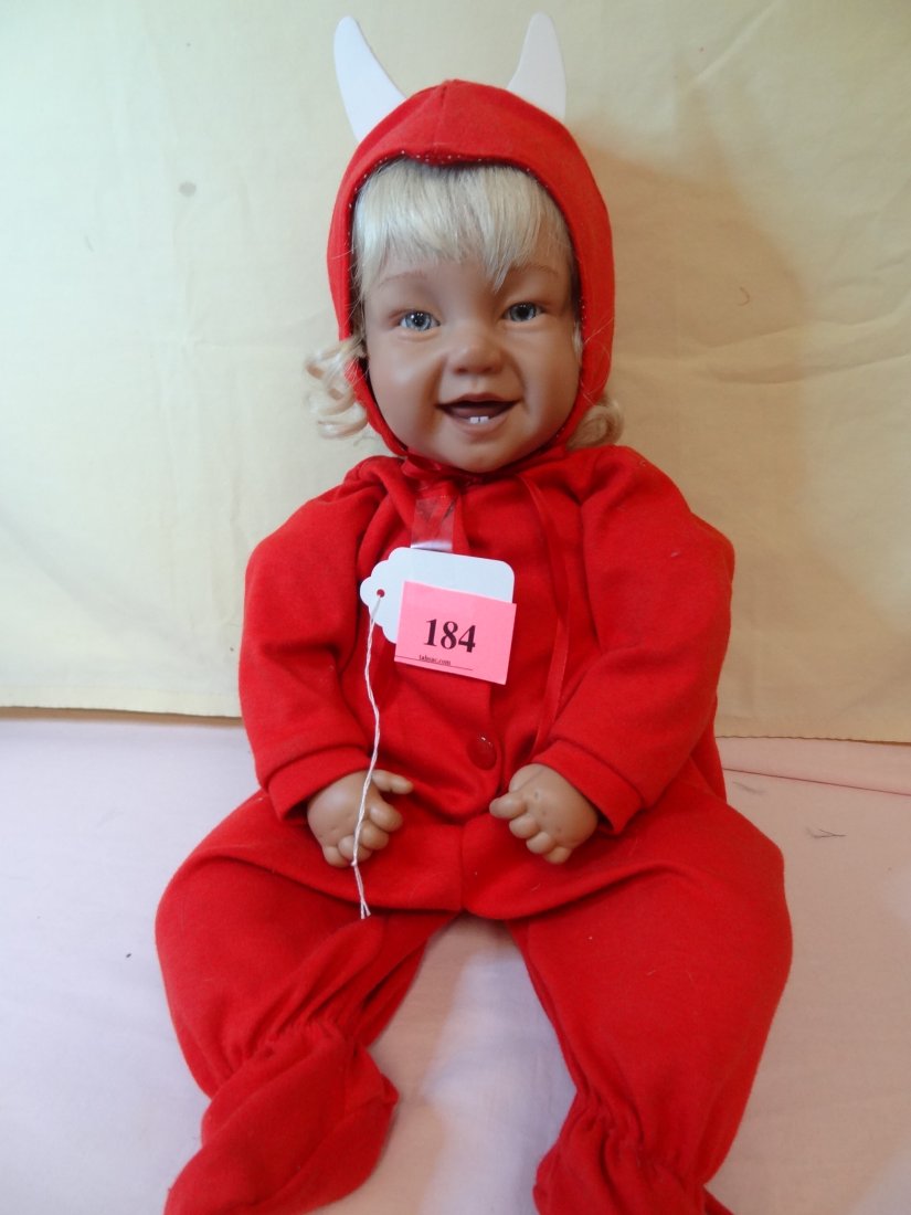 21'' PLASTIC HEAD, HANDS AND FEET, BLONDE HAIR, GL: 21'' PLASTIC HEAD, HANDS AND FEET, BLONDE HAIR, GLASS BLUE EYES, ADORABLE 2 PIECE DEVIL COSTUME, DIMPLED DEFINED HANDS, MARKED ''J COOK 61 LAUGHING 1994 PAT SECRIST''