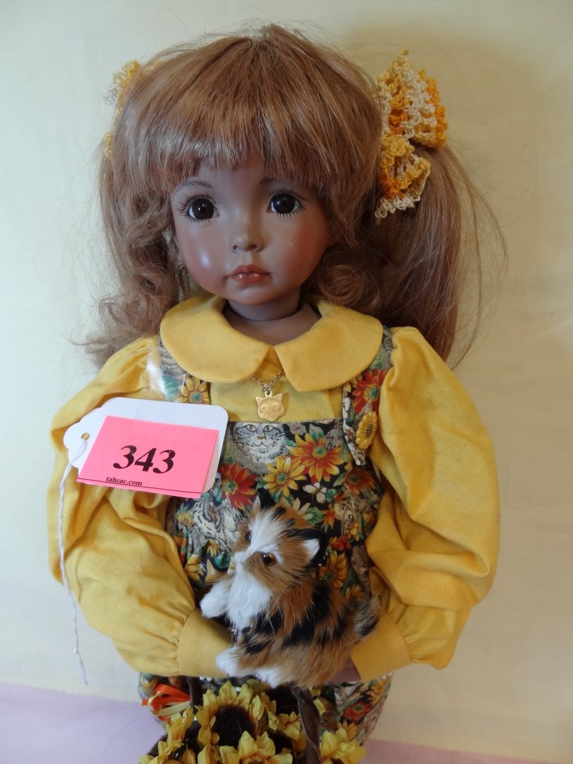 21'' BISQUE HEAD AND LIMBS, CLOTH BODY, KITTY LOVE: 21'' BISQUE HEAD AND LIMBS, CLOTH BODY, KITTY LOVE DOLL WITH CAT JUMPSUIT, AND CAT FIGURE, ALSO FLOWER BASKET, BROWN HAIR, BROWN GLASS EYES, NO VISIBLE MARKS