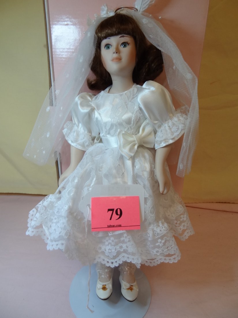 13'' BISQUE DOLL IN WHITE DRESS AND VEIL. DESIGNED : 13'' BISQUE DOLL IN WHITE DRESS AND VEIL. DESIGNED BY ROBERT TONNER. 'CAMELLIA GIRL' (98SP17) NUMBERED 473D. NEW IN BOX.