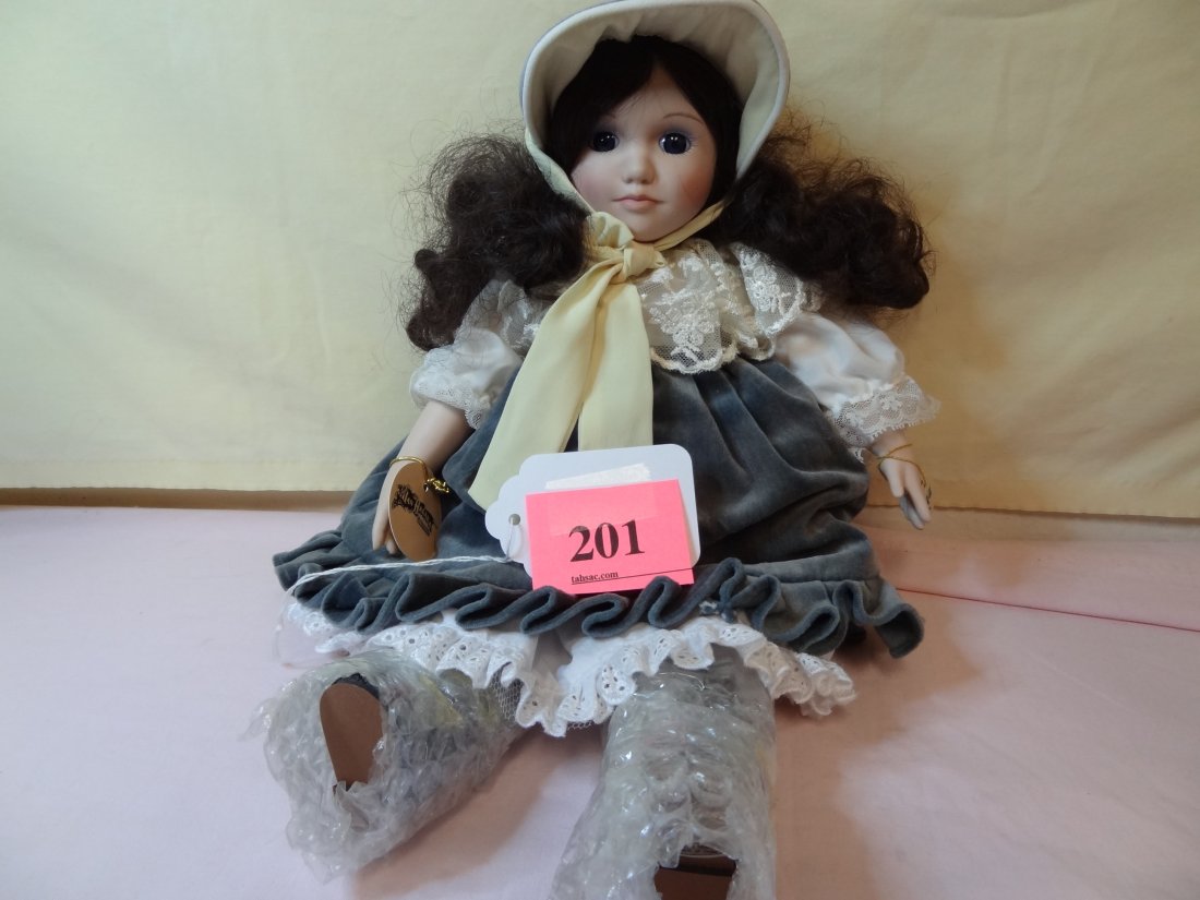 15'' JAN HAGARA ''LISA'', BISQUE HEAD, AND LIMBS, : 15'' JAN HAGARA ''LISA'', BISQUE HEAD, AND LIMBS, SOFT CLOTH BODY, BROWN HAIR, BLUE GLASS EYES, MARKED ''548''