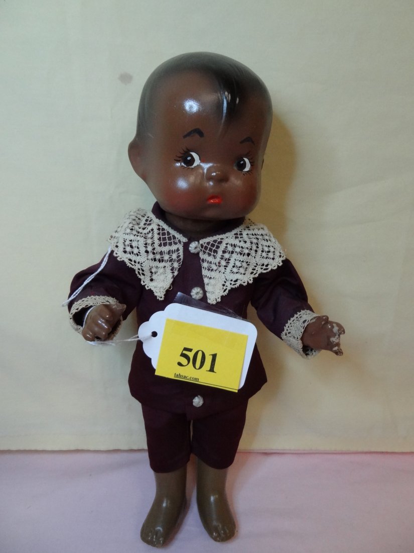 13.5'' BLACK AMERICANA BOY DOLL BY EFFANBEE, COMPO: 13.5'' BLACK AMERICANA BOY DOLL BY EFFANBEE, COMPOSITION, SHOWS WARE TO THE HANDS AND TOES, MOVABLE LIMBS WITH BLACK PAINTED HAIR, BROWN PAINTED EYES, MARKED EFFANBEE SKIPPY ON HEAD AND EFFANBEE PATSY