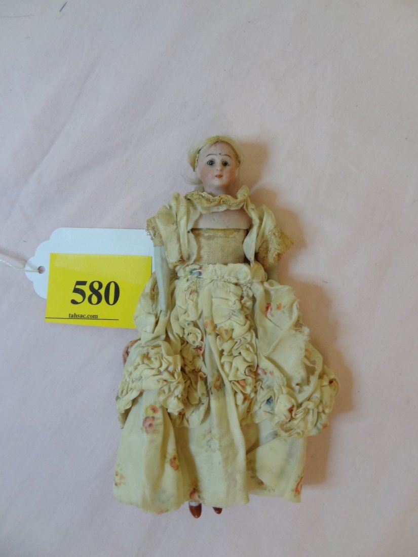 7'' SIMON AND HALBIG DOLL, MOLD NUMBER #1160, MOHA: 7'' SIMON AND HALBIG DOLL, MOLD NUMBER #1160, MOHAIR WIG, GLASS SET EYES, CLOSED MOUTH, CLOTHE BODY WITH BISQUE LIMBS, MOLDED BOOTS, DRESSED BUT VERY OLD AND IS COMING APART, COULD BE ORIGINAL