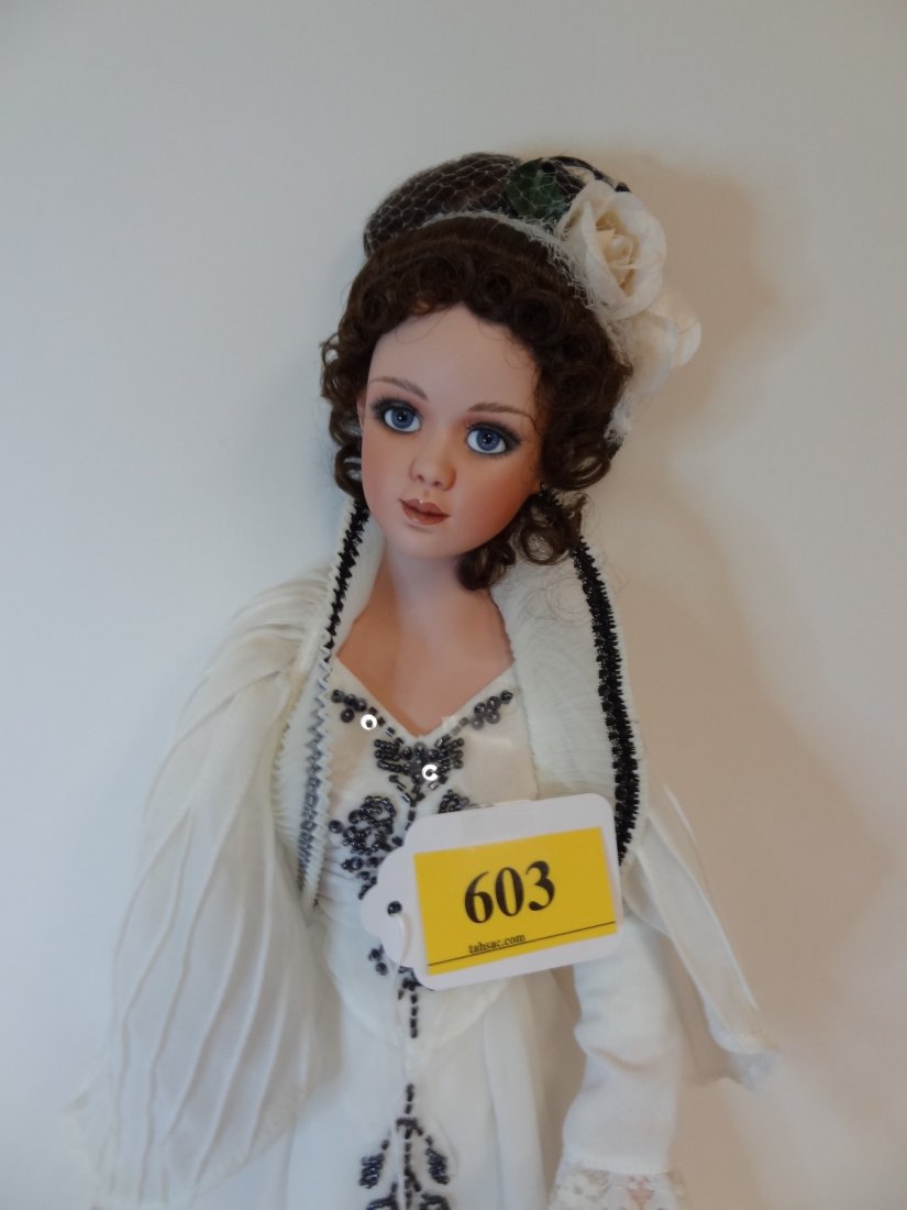 21'' BISQUE HEAD AND LIMBS, MARKED ''1999 #1868A O: 21'' BISQUE HEAD AND LIMBS, MARKED ''1999 #1868A ORIGINAL BY JAN MCLEAN DESIGN, DUNEDIN, NEW ZEALAND'', SOFT CLOTH BODY, BROWN HAIR, BLUE GLASS EYES, PAINTED BOOTS, BEAUTIFUL CHIFFON GOWN WITH BLACK B