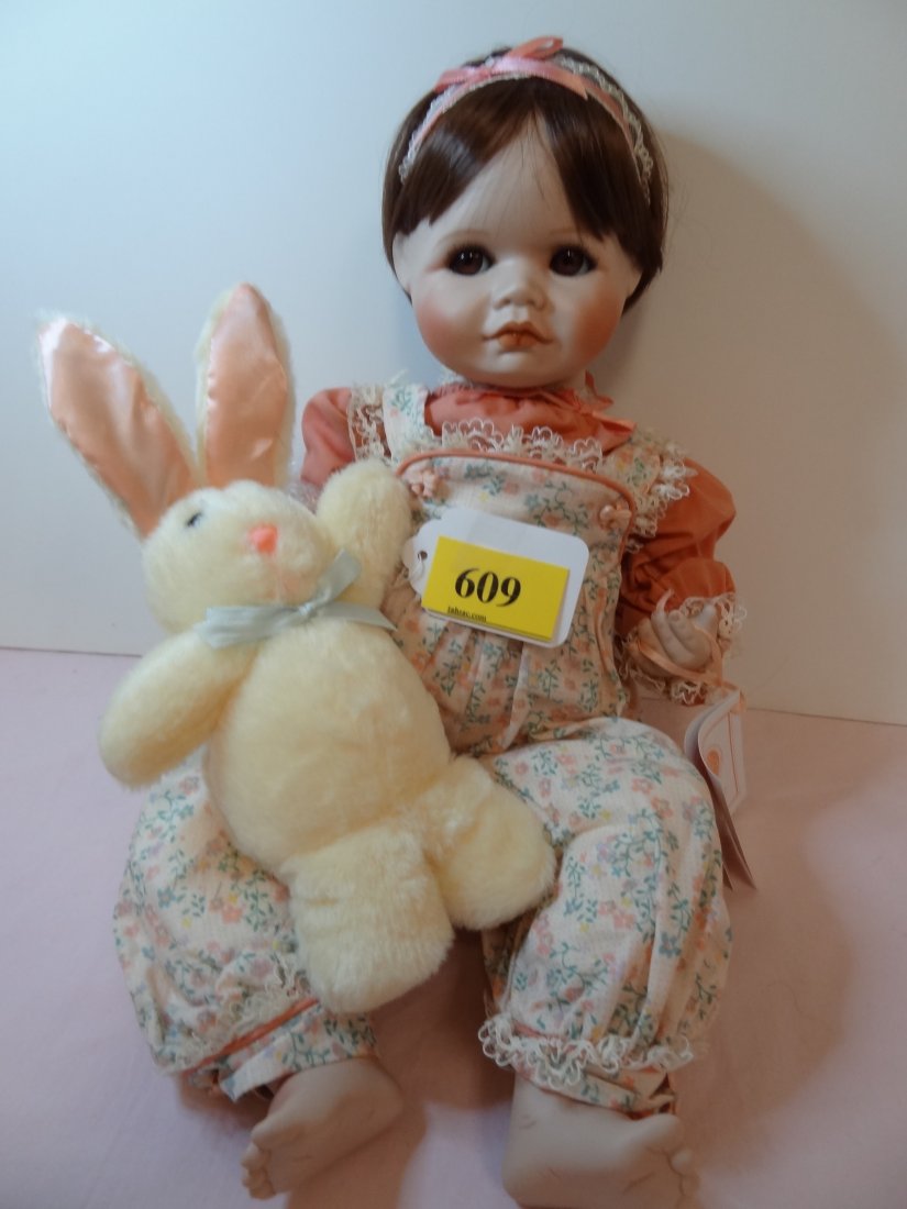 18'' PORCELAIN HEAD, HANDS AND FEET BABY DOLL. SOF: 18'' PORCELAIN HEAD, HANDS AND FEET BABY DOLL. SOFT BODY, BIG BROWN GLASS EYES AND HAIR, SUPER SWEET DOLL, WITH ADORABLE COSTUME AND BUNNY RABBIT, GREAT CONDITION, NEW IN BOX, HAMILTON COLLECTION DOLL