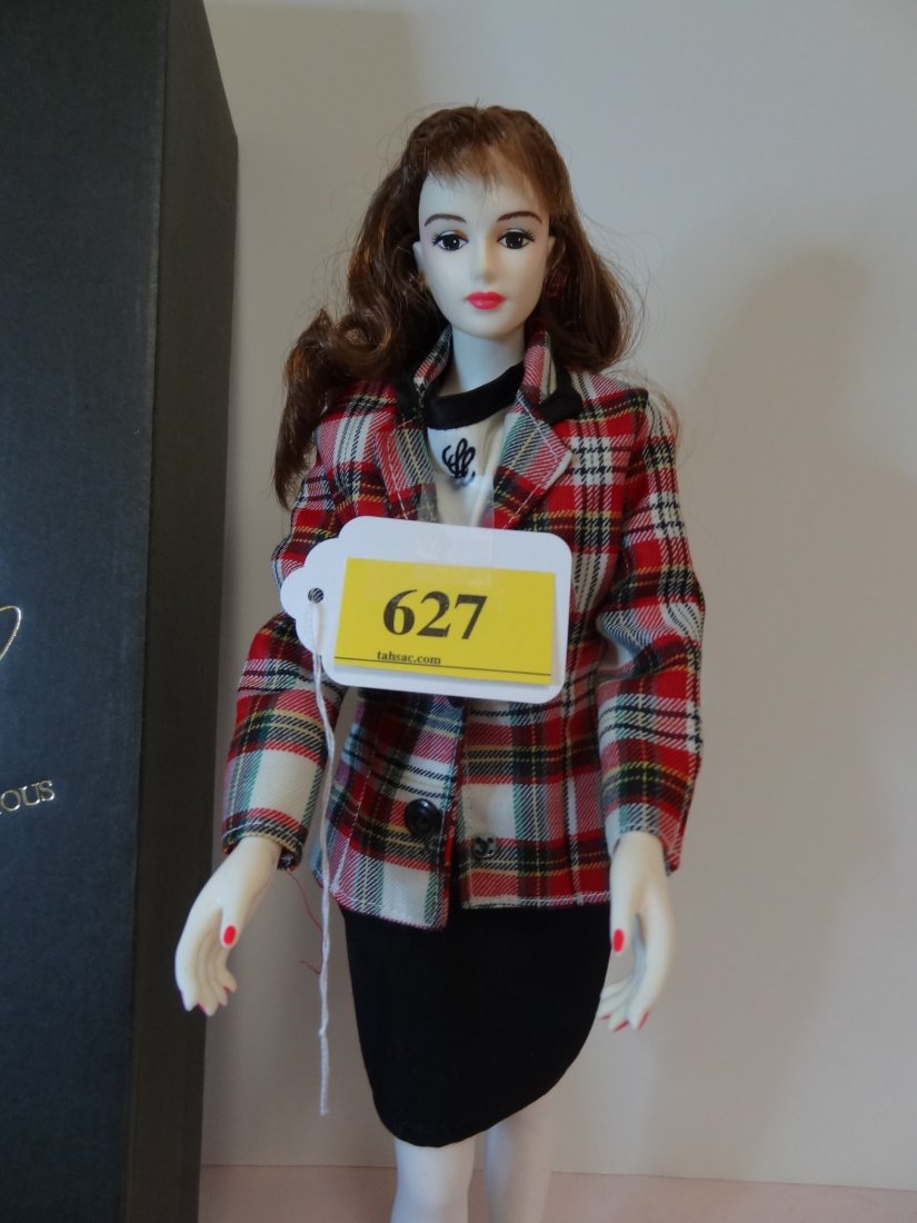 17'' TALL WITH ALLOY STAND, LADY LUMINOUS #912, AL: 17'' TALL WITH ALLOY STAND, LADY LUMINOUS #912, ALL PLASTIC, MOVEABLE NECK AND ARMS. LONG READ HAIR, PAINTED BROWN EYES, BUSINESS SUIT WITH EARRINGS, RED PAINTED FINGER NAILS AND RED PLASTIC SHOES. CO