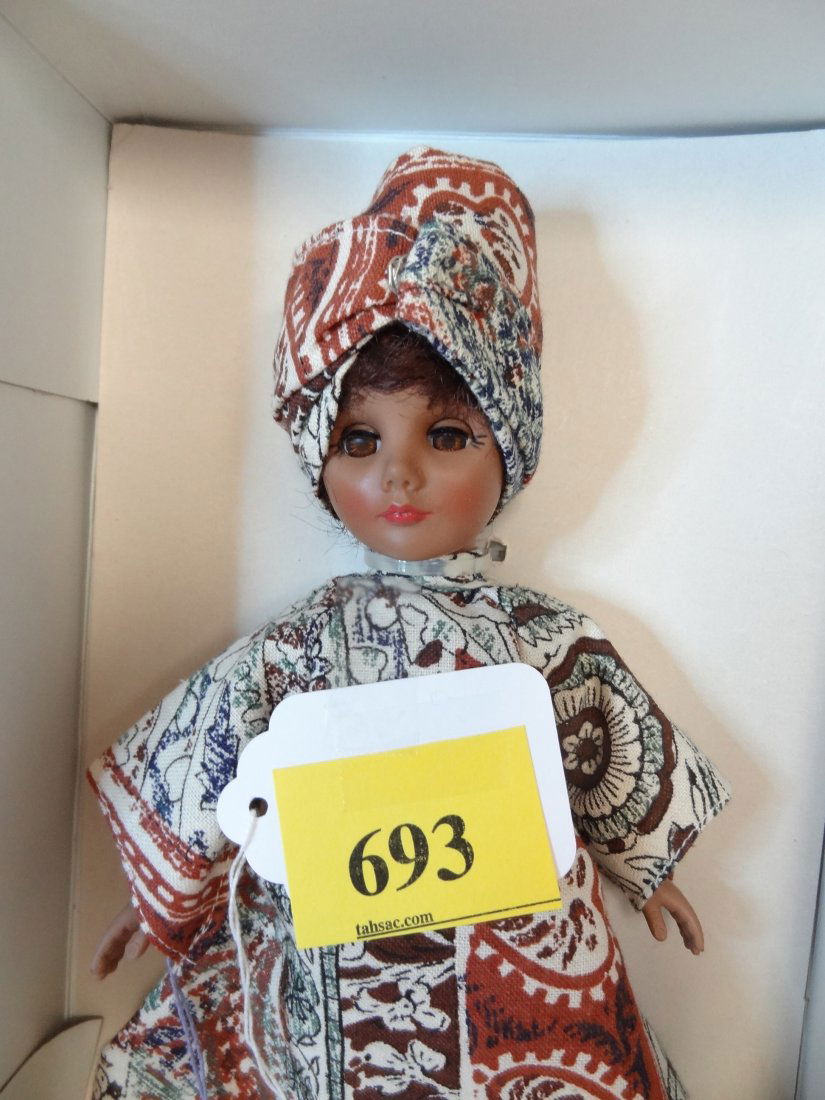 11" 'WONDERFUL WORLD OF EFFANBEE DOLLS' MISS BLACK: 11" 'WONDERFUL WORLD OF EFFANBEE DOLLS' MISS BLACK AMERICA INTERNATIONAL DOLL, 'DRESSED IN AN AUTHENTIC COSTUME OF MY COUNTRY', EFFANBEE DOLL CORP. ALL PLASTIC DOLL, MOVEABLE JOINTS, DARK BROWN HAIR,