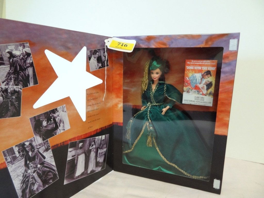 12'' BARBIE ''SCARLETT O'HARA'' DOLL, PART OF THE: 12'' BARBIE ''SCARLETT O'HARA'' DOLL, PART OF THE HOLLYWOOD LEGENDS COLLECTION: SEE LOT NUMBERS 716-720, MADE BY MATTEL 1994, GONE WITH THE WIND DOLL, A FABULOUS GIFT IDEA! DRESSED IN GREEN GOWN MADE