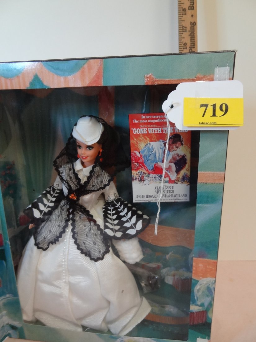 12'' BARBIE ''SCARLETT O'HARA'' DOLL, PART OF THE: 12'' BARBIE ''SCARLETT O'HARA'' DOLL, PART OF THE HOLLYWOOD LEGENDS COLLECTION: SEE LOT NUMBERS 716-720, MADE BY MATTEL 1994, GONE WITH THE WIND DOLL, A FABULOUS GIFT IDEA! DRESSED IN ELEGANT RED GOWN