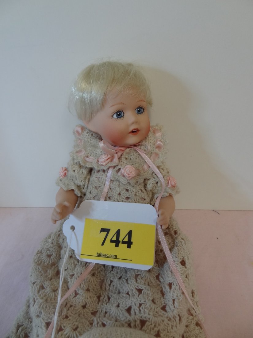 10'' 1994/2000 SIGNATURE MARK READS FIRST NAME ''P: 10'' 1994/2000 SIGNATURE MARK READS FIRST NAME ''PATRICIA'', THOUGH TOO SMALL TO READ ENTIRE SIGNATURE. ALL BISQUE DOLL, MOVEABLE HEAD AND LIMBS, GLASS EYES, BLONDE HAIR, OPEN MOUTH WITH TWO TEETH SHO